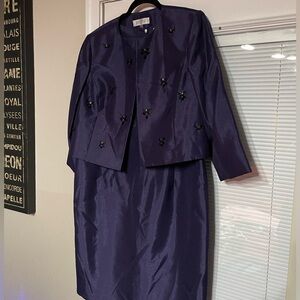 This is a Kasper women's purple beaded jacket and dress suit.